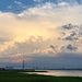 Clouds and golden light over Charleston Harbor by congaree