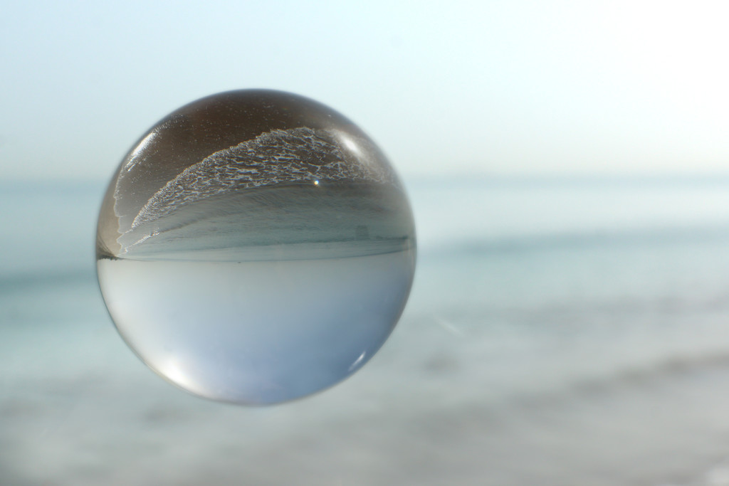 Lens ball at the sea by ingrid01