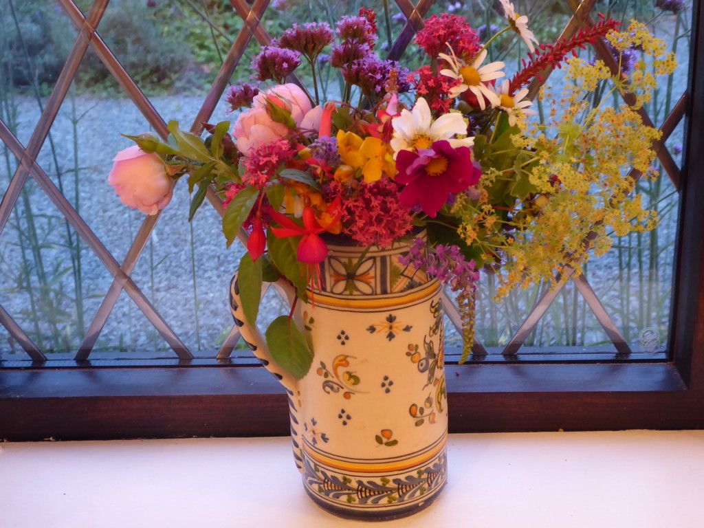 another vase of flowers from the garden by snowy