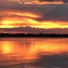 Sunset over the Ashley River and marshes at high tide by congaree