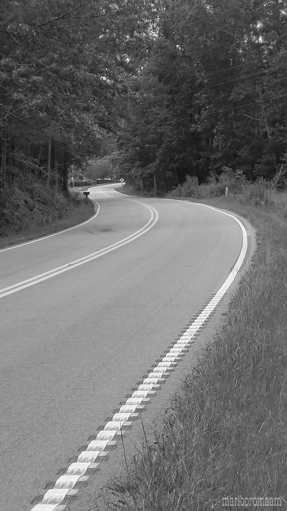 Curve up ahead... by marlboromaam