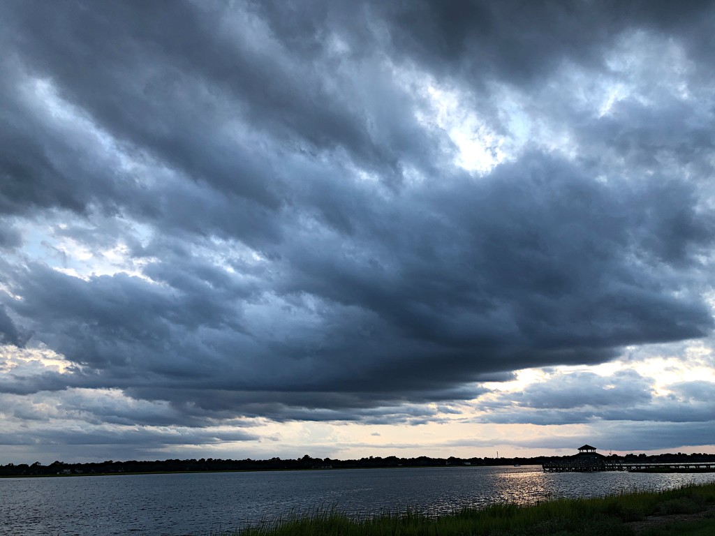 Dramatic sky and clouds over the Ashley River by congaree