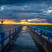 Charlevoix Pier at Sunset by rosiekerr