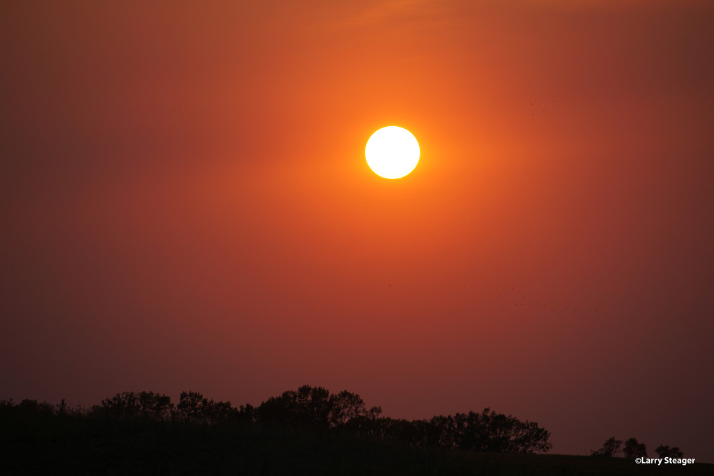 Sunset on a very hot day by larrysphotos