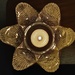 A floral shaped candle holder dish. by grace55