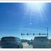 Fifteen Red Lights on a sunny day — as seen through a dirty car window  by mcsiegle