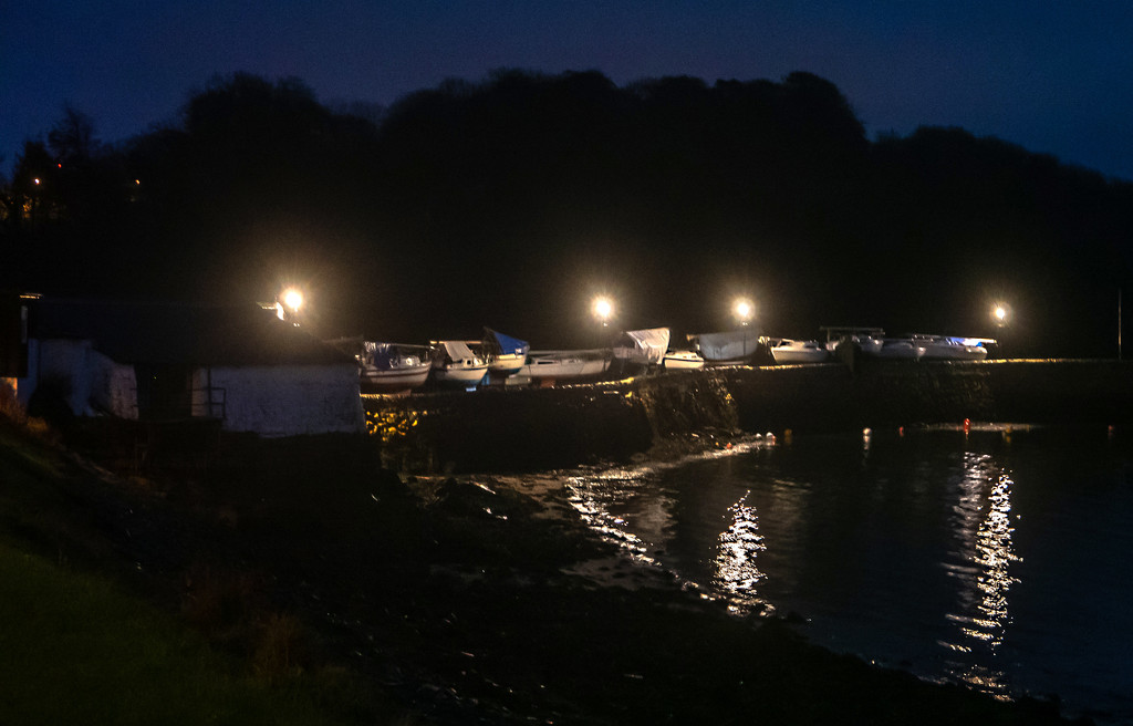 Harbour wall at night by frequentframes