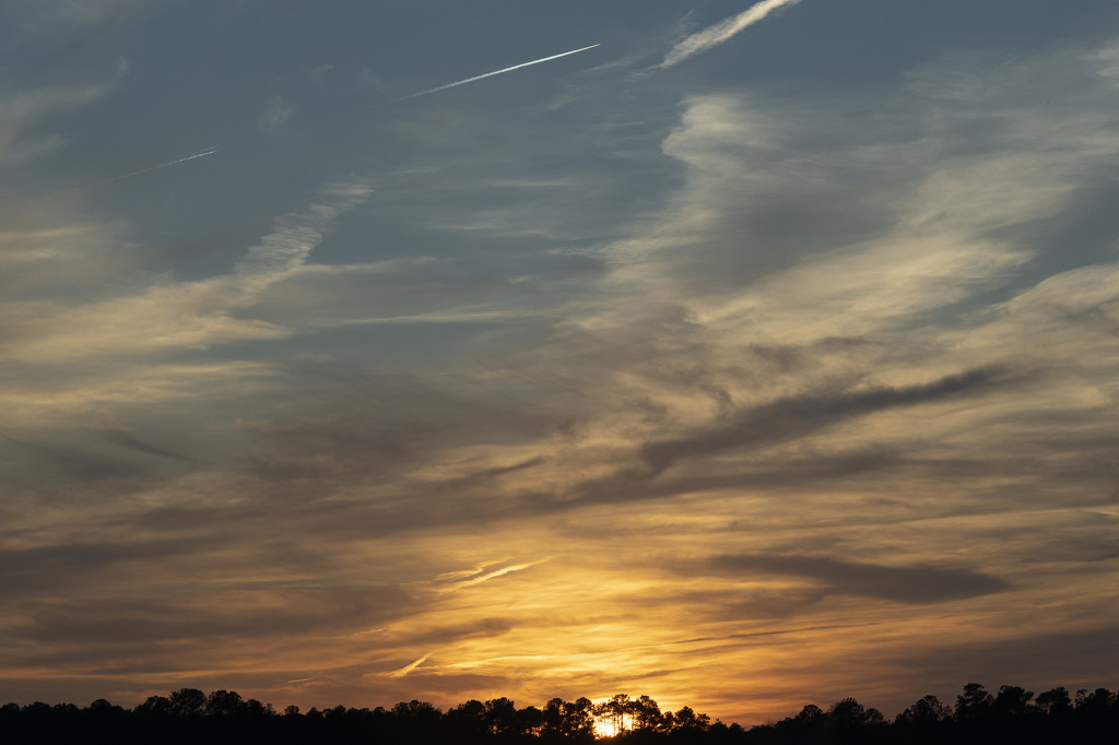 Sunset, Contrails, and Cirrus Clouds by timerskine