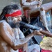 Didgeridoo player busking near the Manly ferry   by johnfalconer