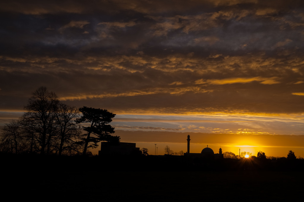 Sunrise and minaret by rumpelstiltskin