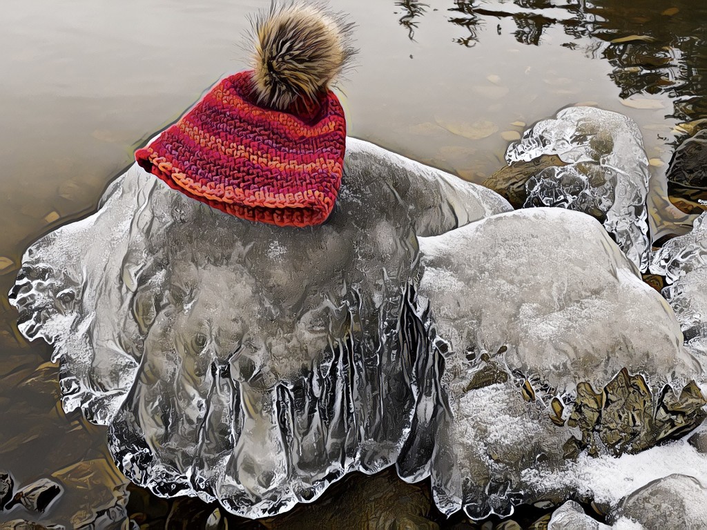 ICE covered rock decorated with my Toque! by radiogirl