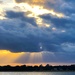 Sunrays at sunset along the Ashley River, Charleston by congaree