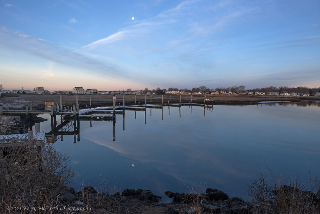 Tiny setting moon reflected by mccarth1