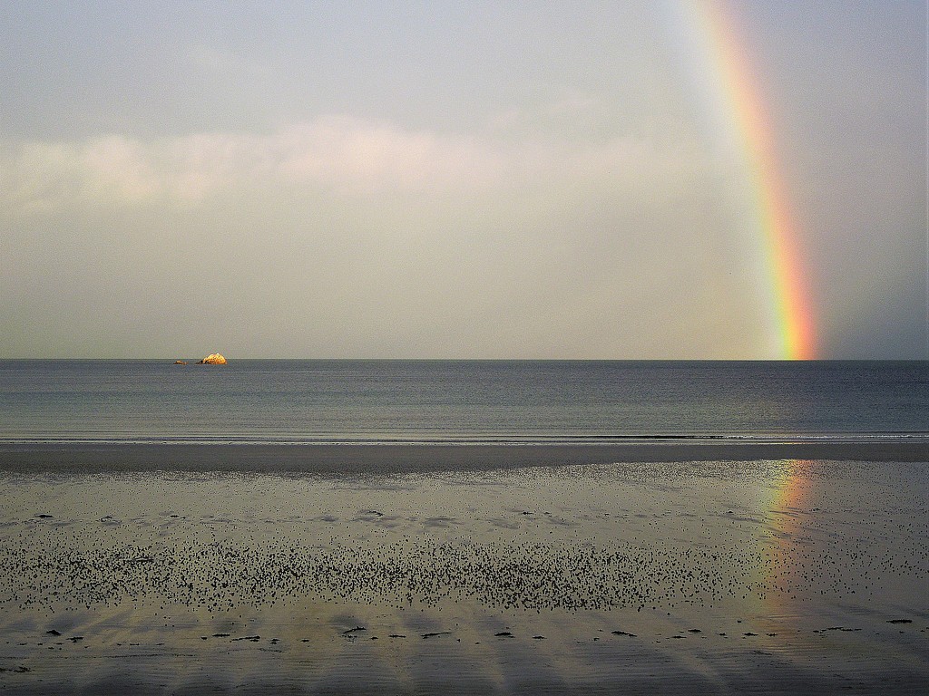 A rainbow from the sea by etienne