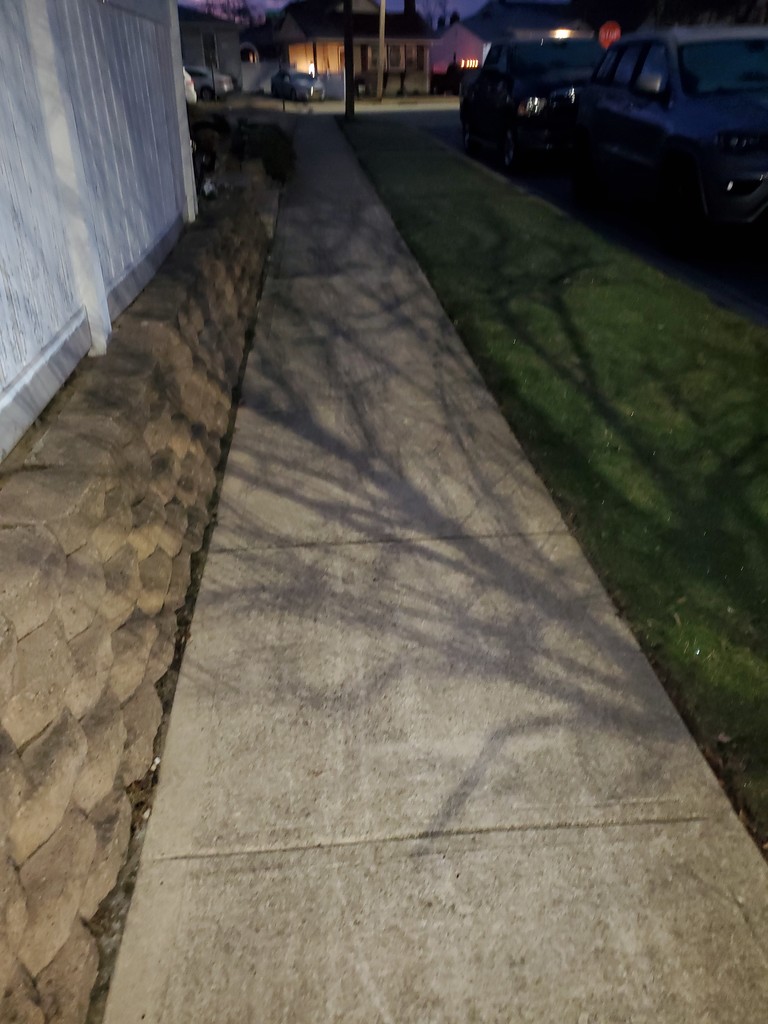 Sidewalk shadow by jb030958