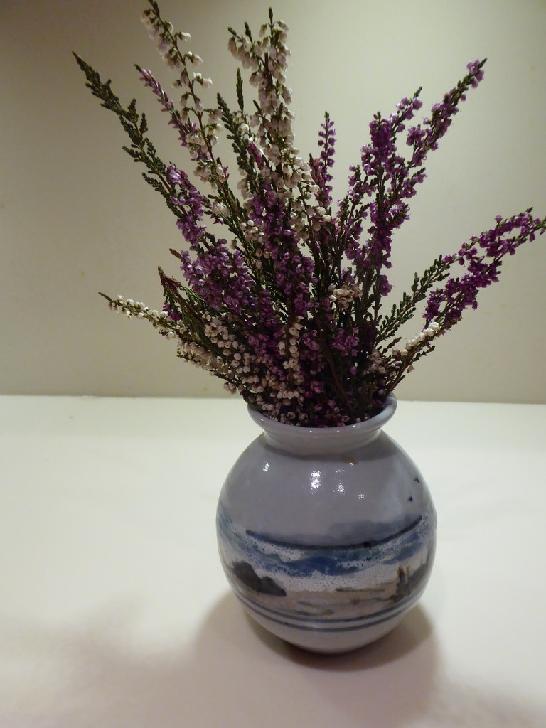 Vase of heather by snowy