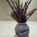 Vase of heather by snowy