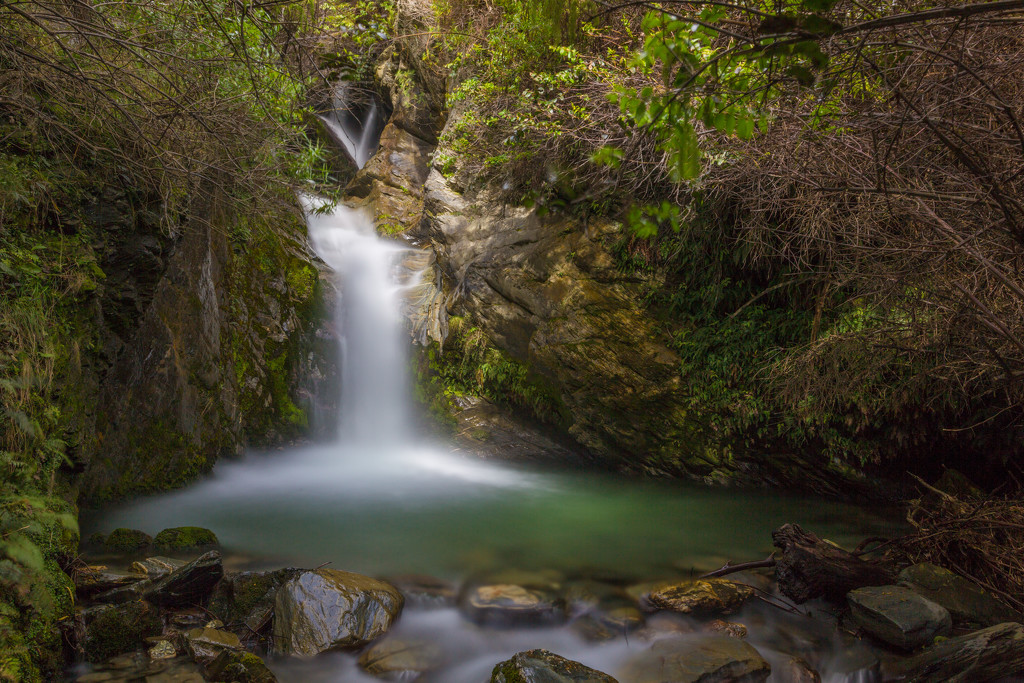 Hidden waterfall in Queenstown by creative_shots