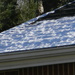 Snow on Neighbors' Roof by sfeldphotos