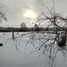 Snowy Landscape with Pale Sun.  by kclaire