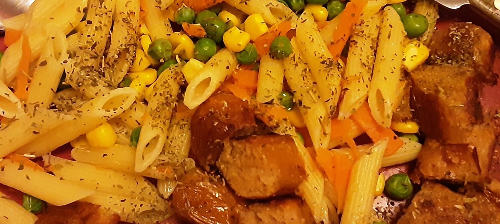 Vegan sausages,  mixed vegetables and penne pasta. by grace55