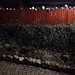 Night Scene: A Fence with Cups. by kclaire