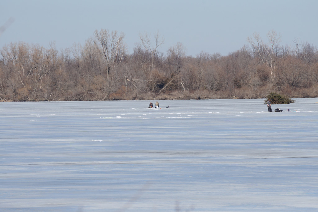 Ice fishing by larrysphotos