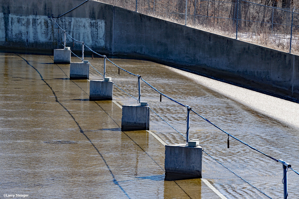 Water over the dam by larrysphotos