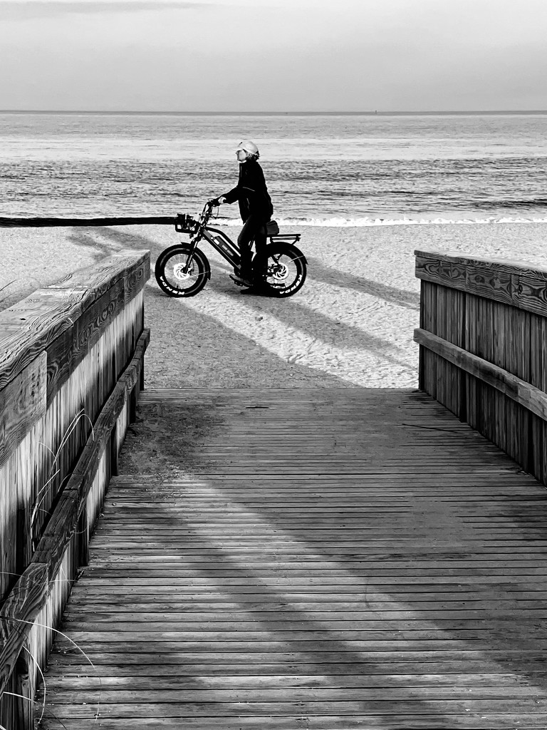 Sandie Lee on the bike on the beach.  by clayt