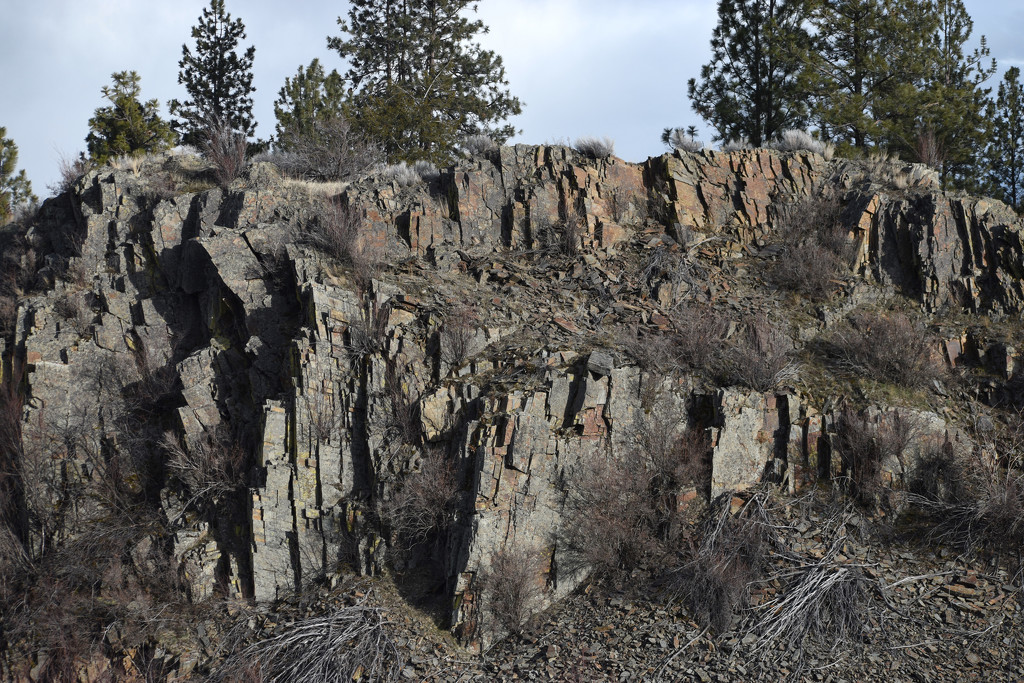 Rocky Outcropping Along The Railroad Tracks by bjywamer