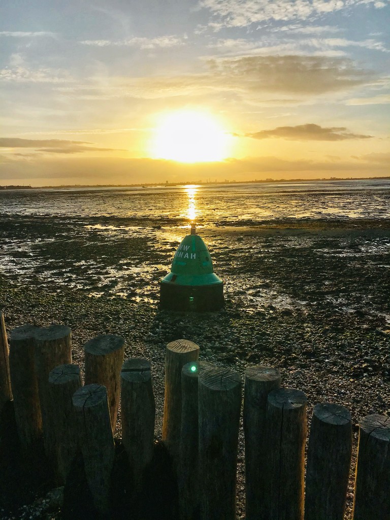 Washed up buoy & Sunset. by wakelys