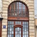 Balcony with hearts above a big door.  by cocobella