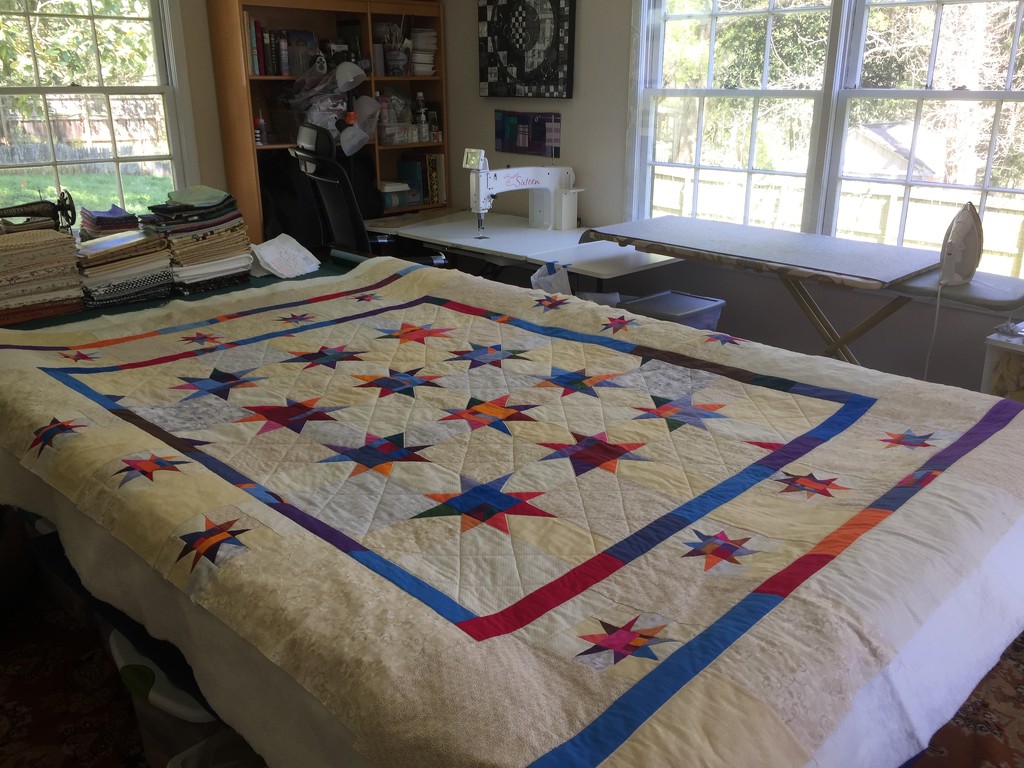 quilting has begun on the wonky stars by margonaut