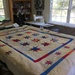 quilting has begun on the wonky stars by margonaut