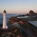 Castlepoint lighthouse at sunrise by maureenpp
