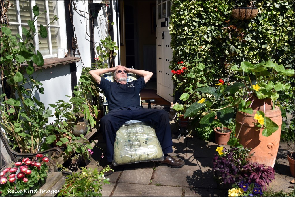 Steve sunning himself outside the front door by rosiekind
