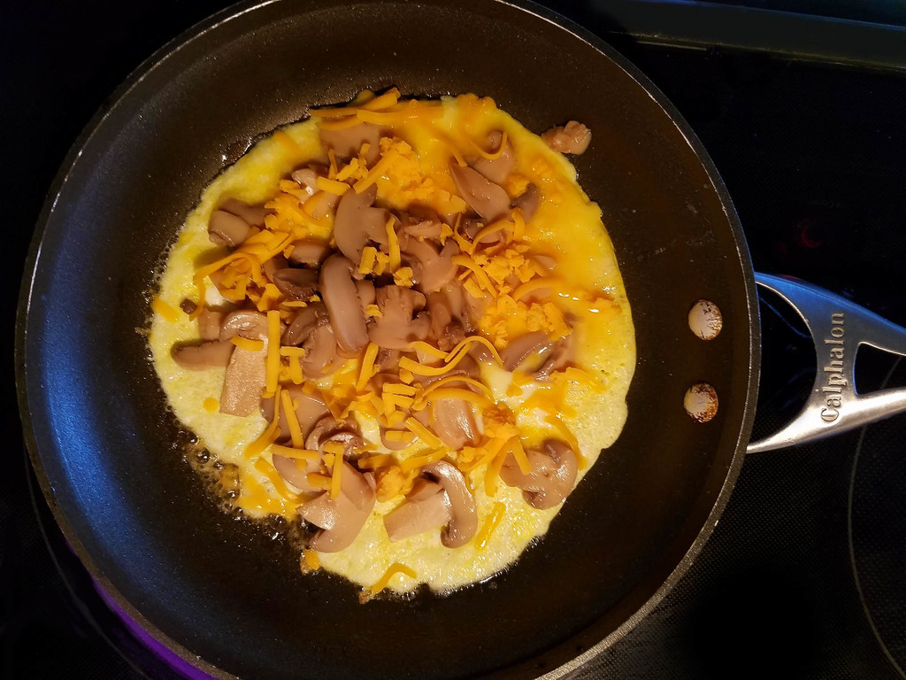 Mushroom & cheese omelet for breakfast by randystreat
