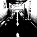 Hallway in B&W (and a touch of red) by mcsiegle