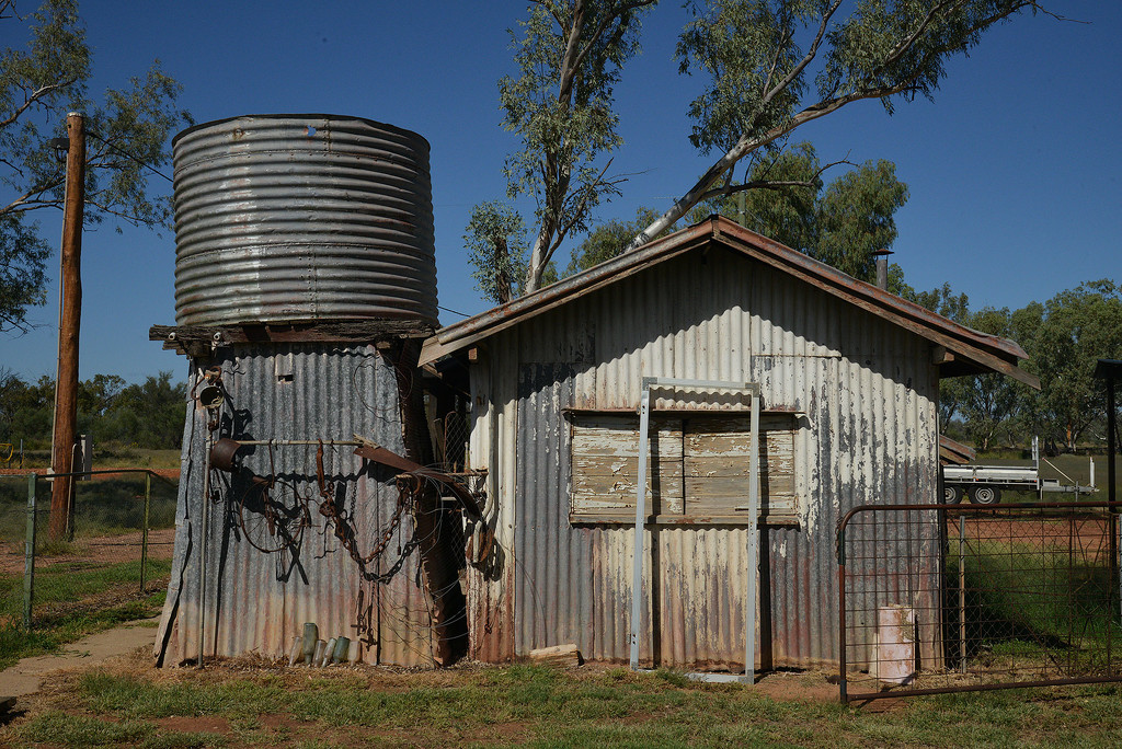Water tank and shed at Bowra  by jeneurell
