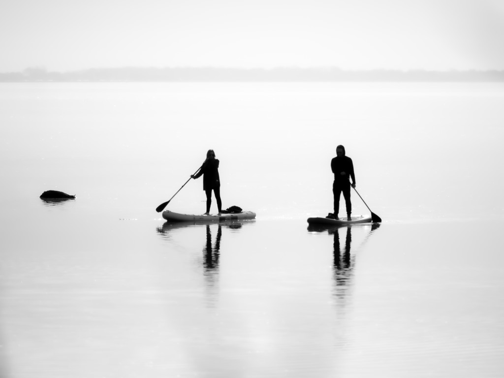 two paddle boards and a rock... by northy