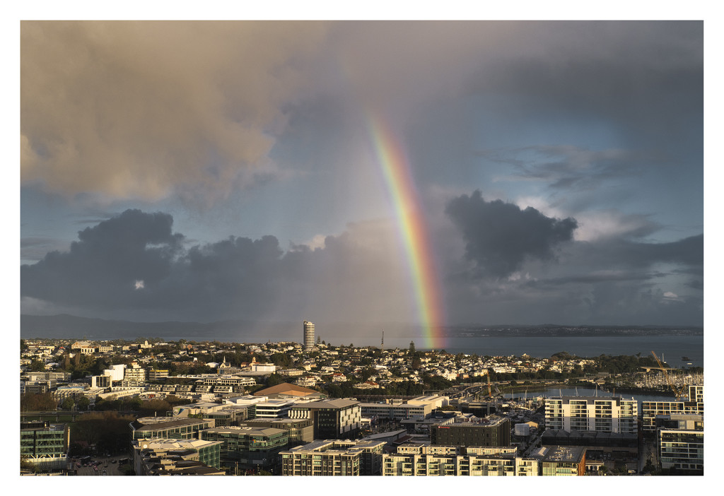 Rainbow over the city by dkbarnett
