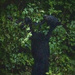 Black Bear Reaching for Salmonberries  by jgpittenger