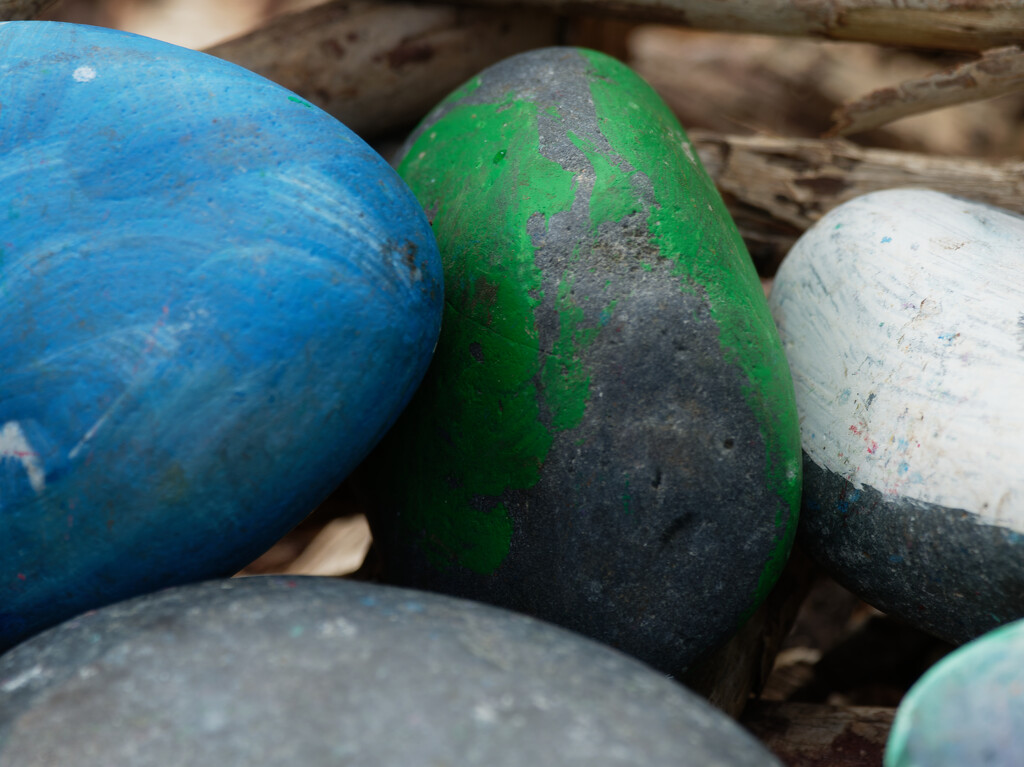 painted rocks in a basket by rminer