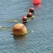 A line of Buoys.  by bill_gk