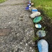 Row of painted stones  by cafict