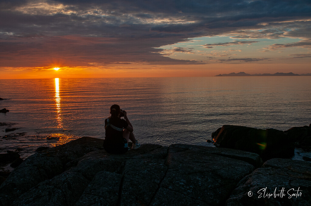 My oldest daughter photographs the midnight sun by elisasaeter