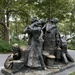 Immigrants statue at the Battery by graceratliff