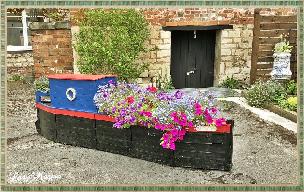 Barge Moves with Flower Power. by ladymagpie