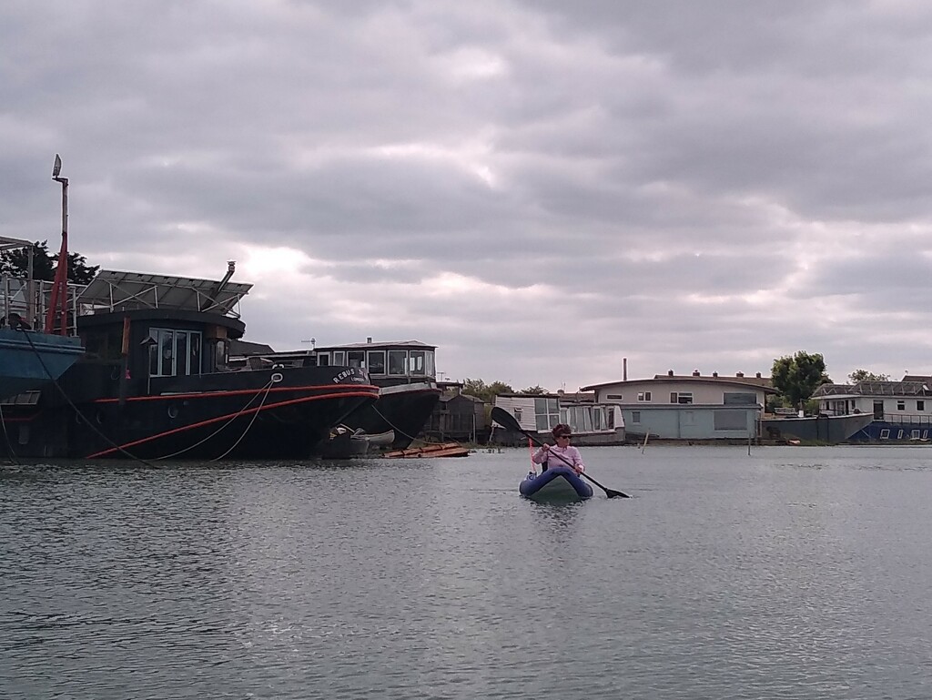 Paddling by the Houseboats by moirab