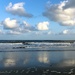 Cloud reflections on the beach by congaree